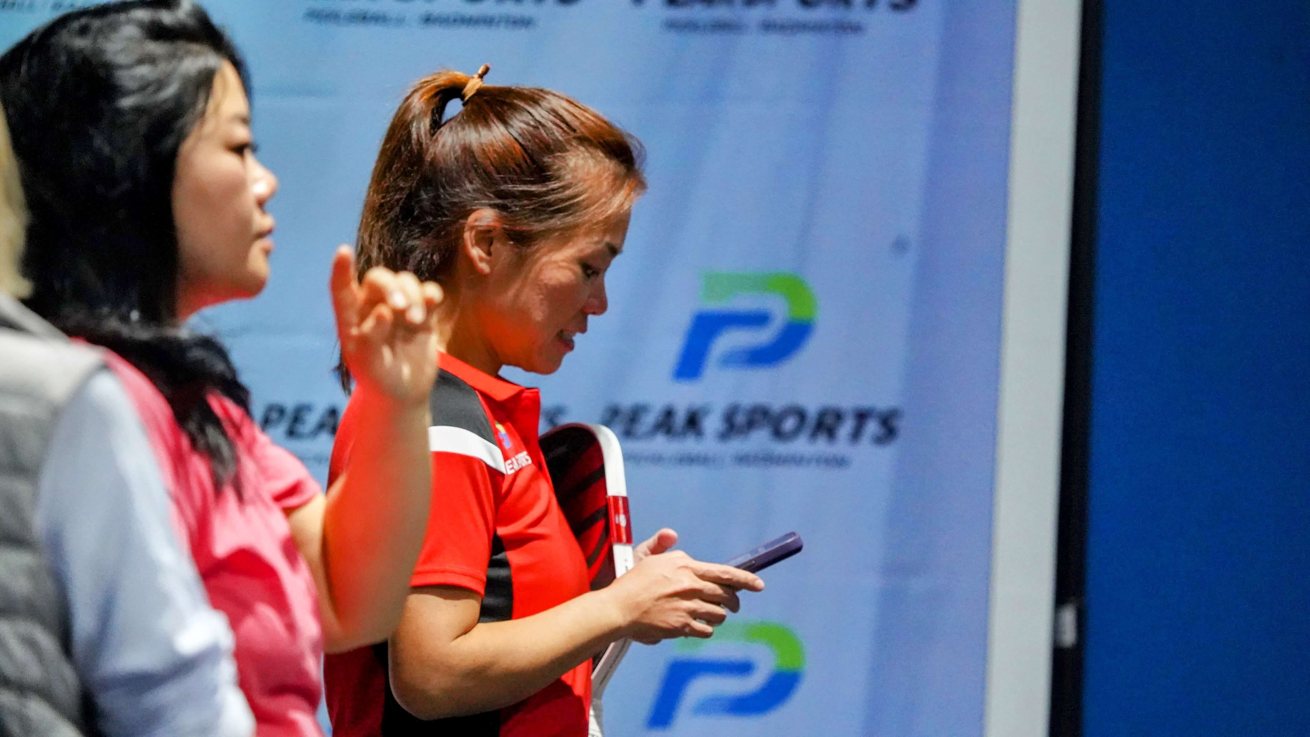 Tournament Staff Coordination - Professional event organization with Peak Sports branding